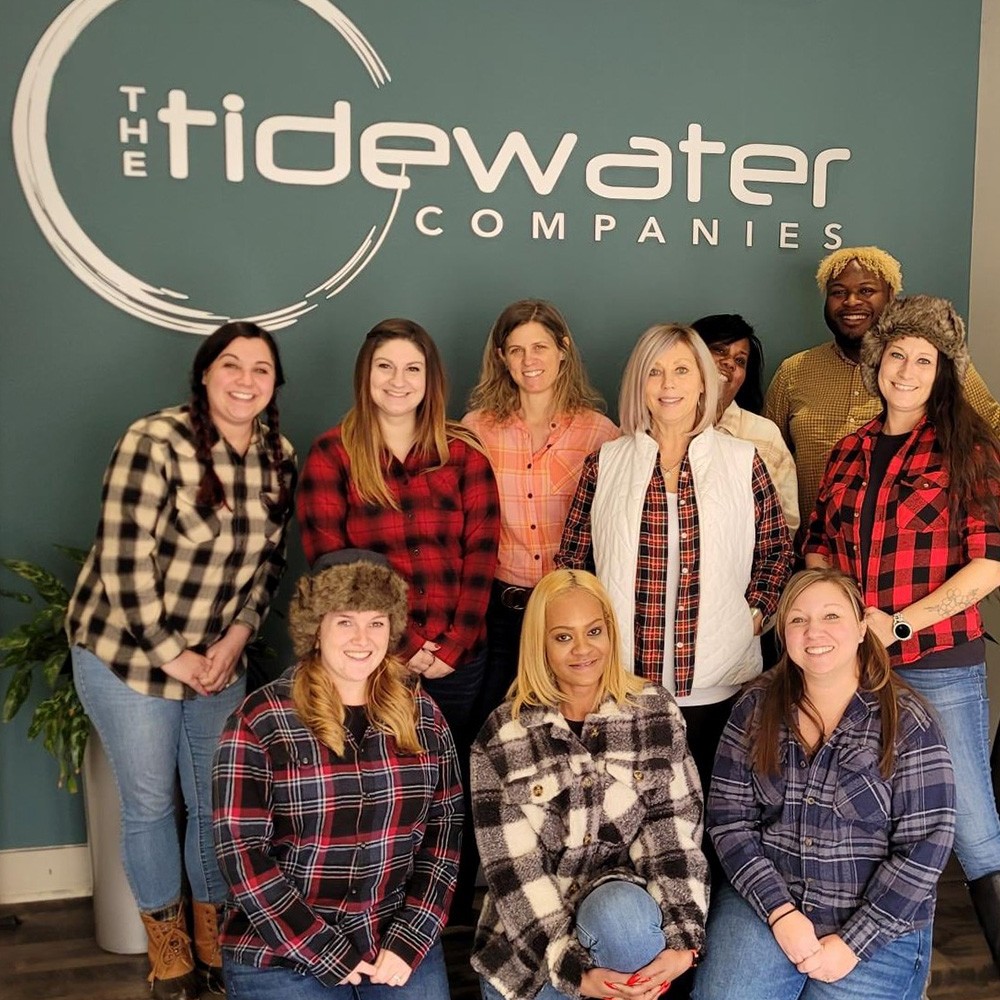 tidewater companies employees wearing matching flannel shirts