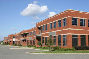 Commercial office park on a sunny day with blue skies.