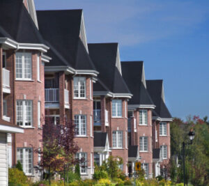 Rows of apartment buildings in a brick apartment complex.